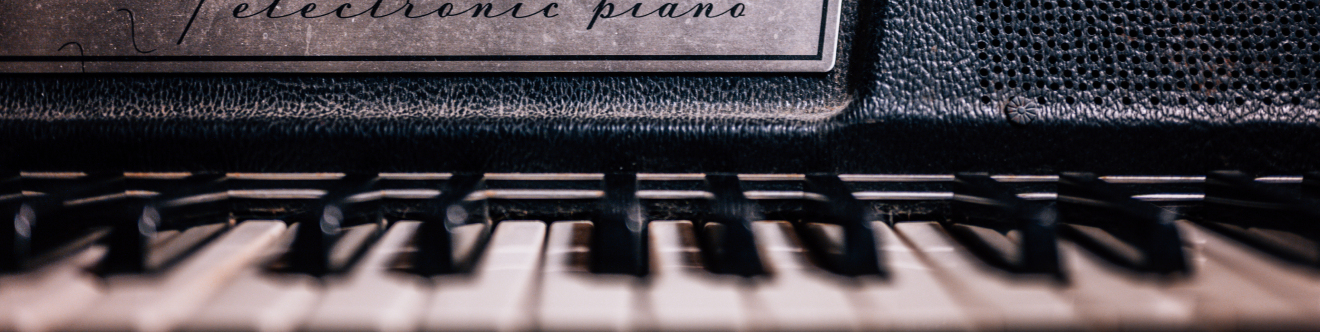 Wide closeup of an electric piano.